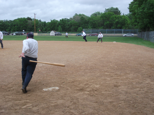 Jody "Sidewinder" Ebnet takes off towards first after a "fair-foul" hit