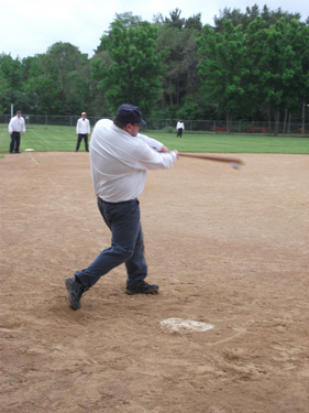 Erik "Sugar" Sjogren smashes a "daisy-cutter" to left field