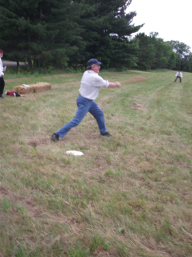 "Kid" Liberty of the St. Croix's takes a mighty swing.